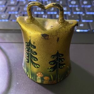Antique vintage metal riveted cowbell painted trees dates back to 1905 b…